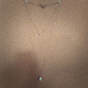 Double necklace with pearl pendant